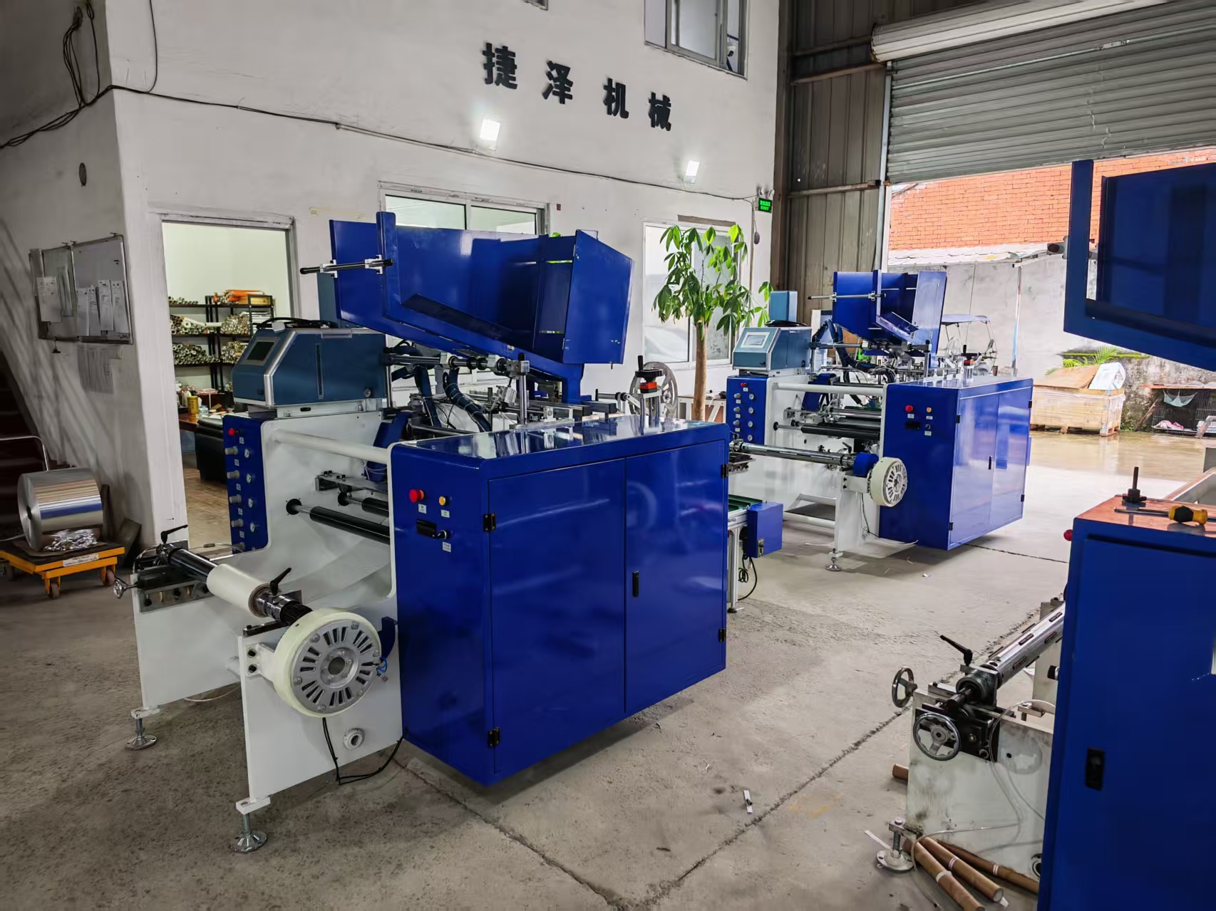 Two 6‑station aluminum foil rewinding machines — fully assembled and tested, ready for packing and shipment
